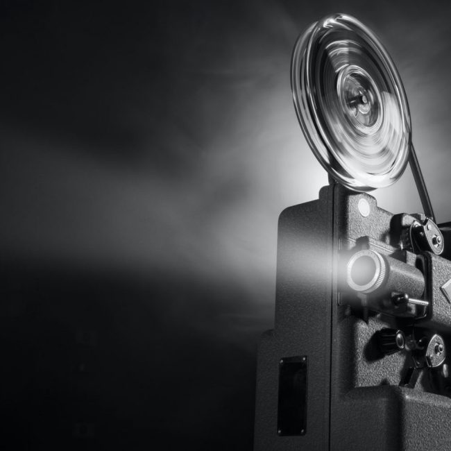 vintage-film-projector-and-film-screening-e1613621176577-1.jpg